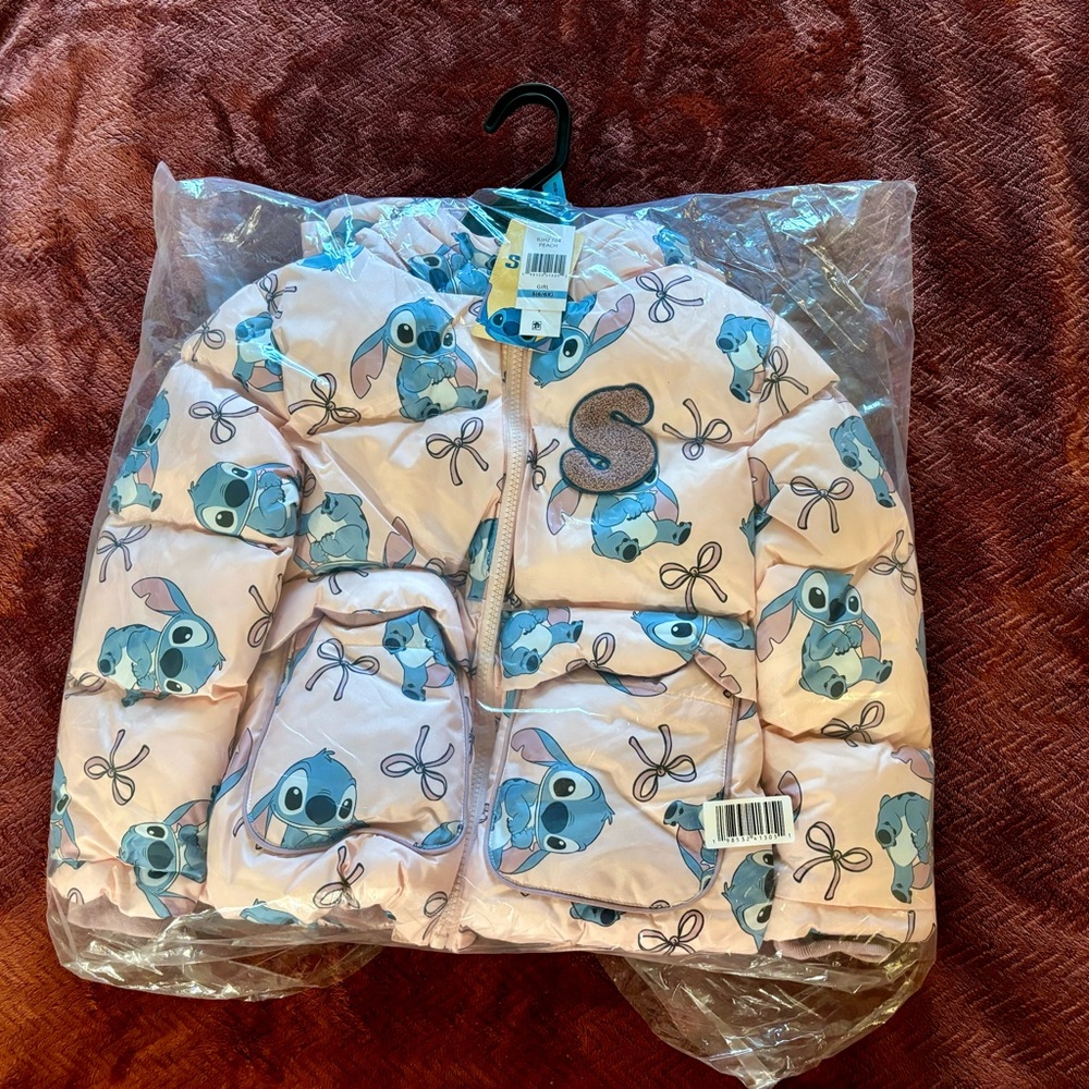 Disney Pink Puffer Jacket with Blue Character Print and  'S' Patch